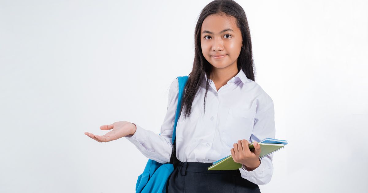 Teenage school girl looking confused about what an adolescent wellbeing coach is.
