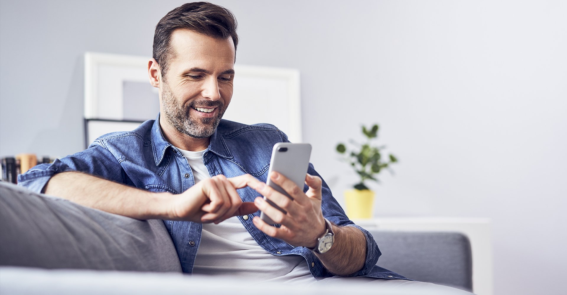 man using a phone - QR Code Alternatives