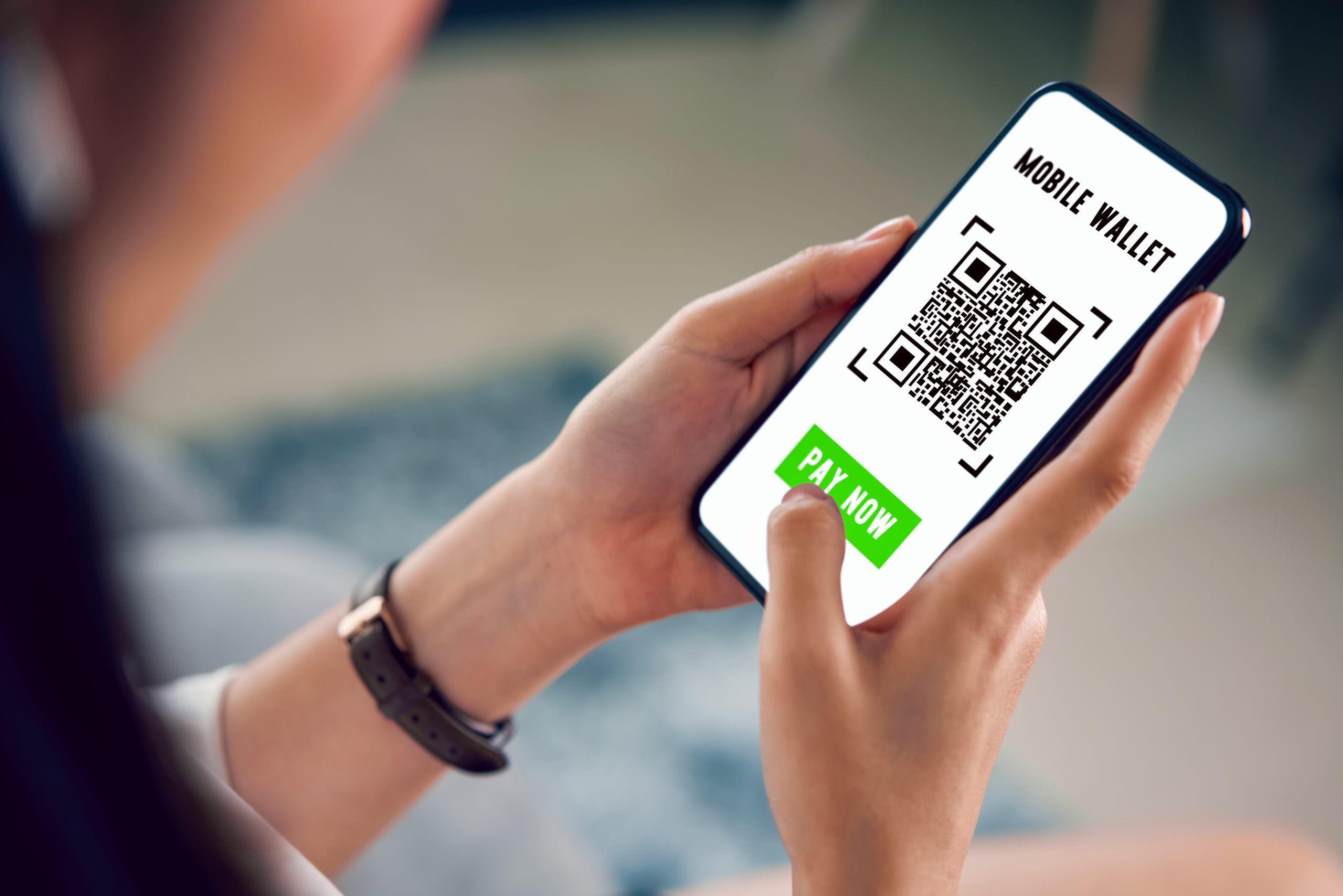 Person Using QR - NFC vs QR Code