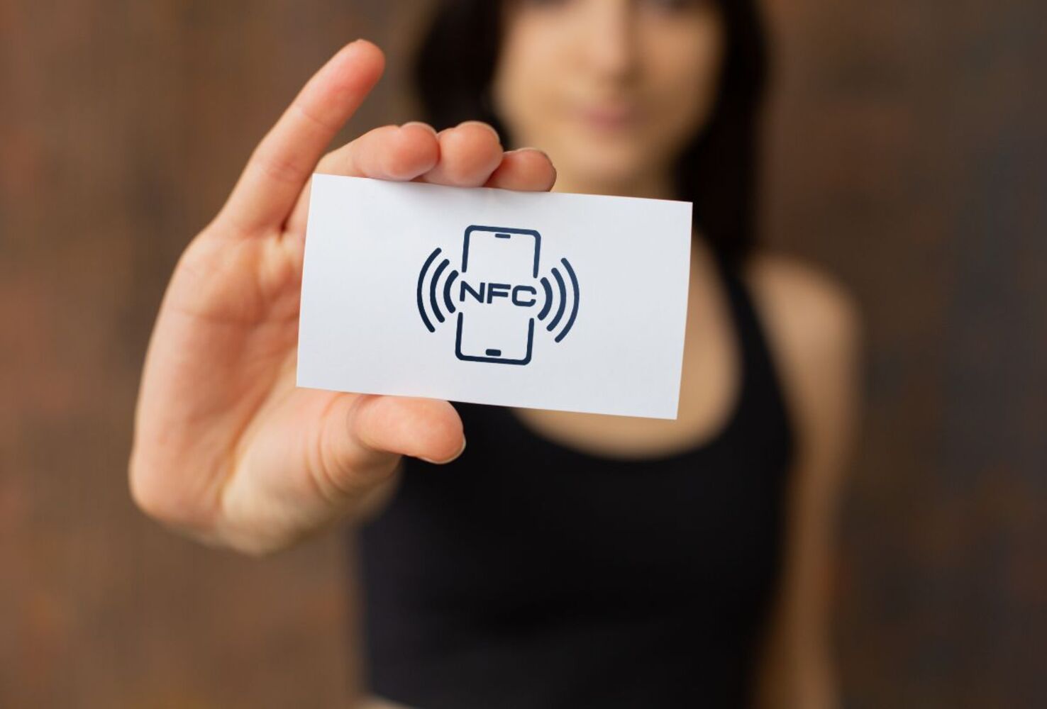 Person Holding NFC Card - How Do NFC Business Cards Work