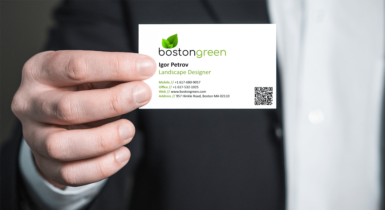 man holding a business card - QR Code on Business Card Good or Bad
