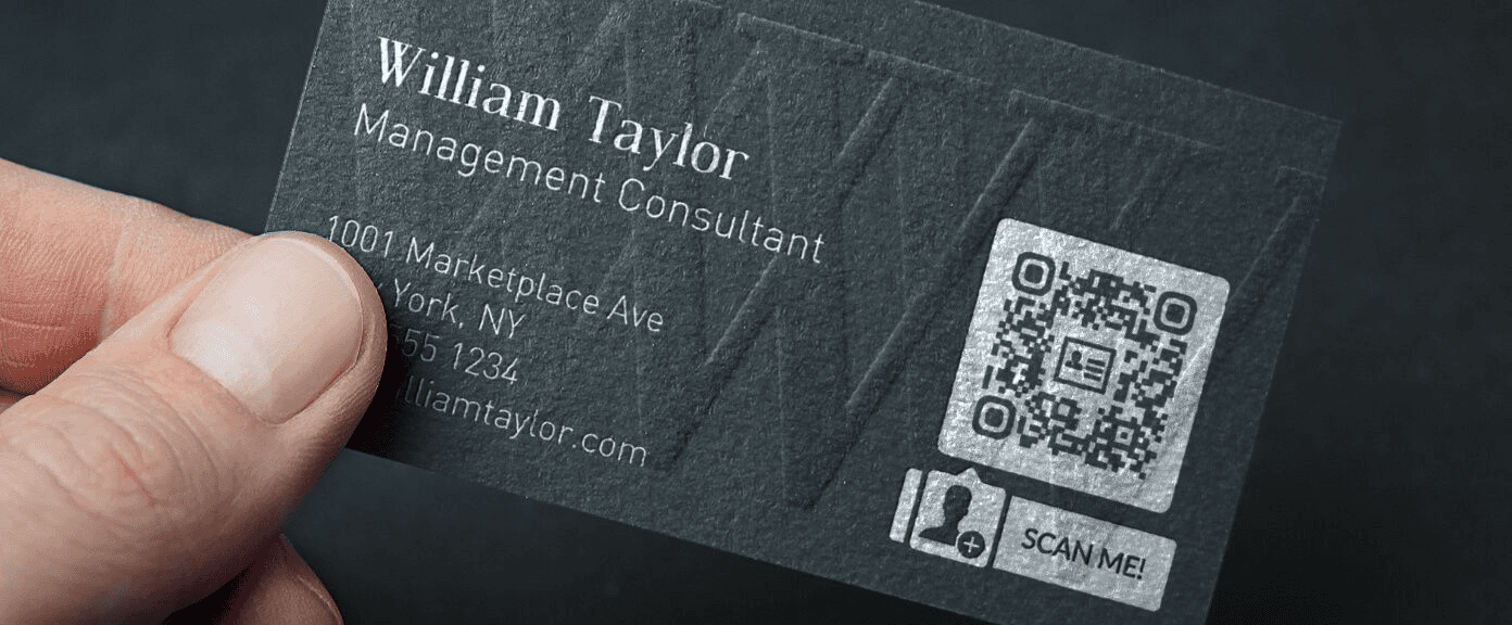 Person holding a Business card - LinkedIn QR Code Business Card