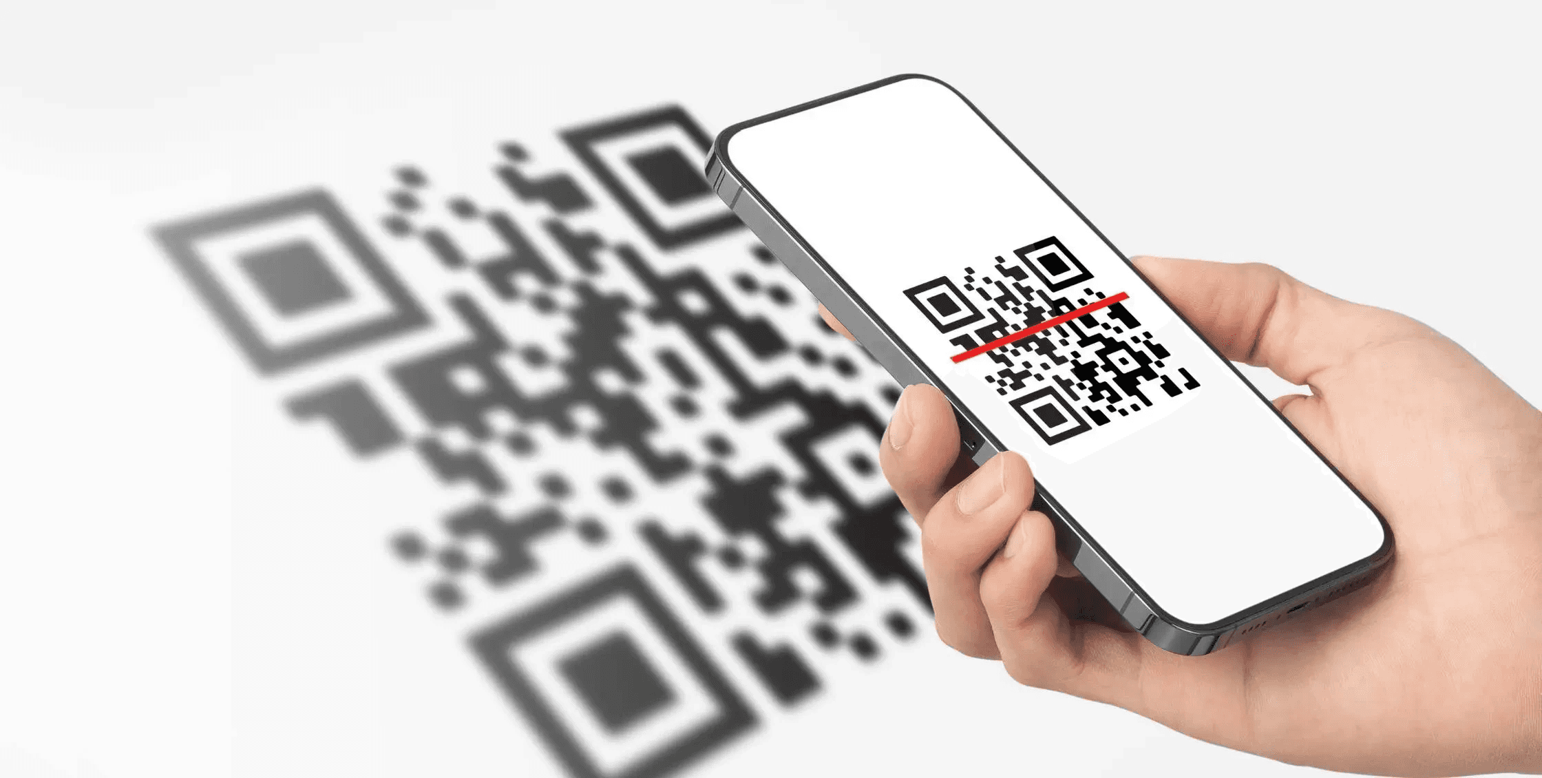 Hand scanning QR code with smartphone - Static vs Dynamic QR Code
