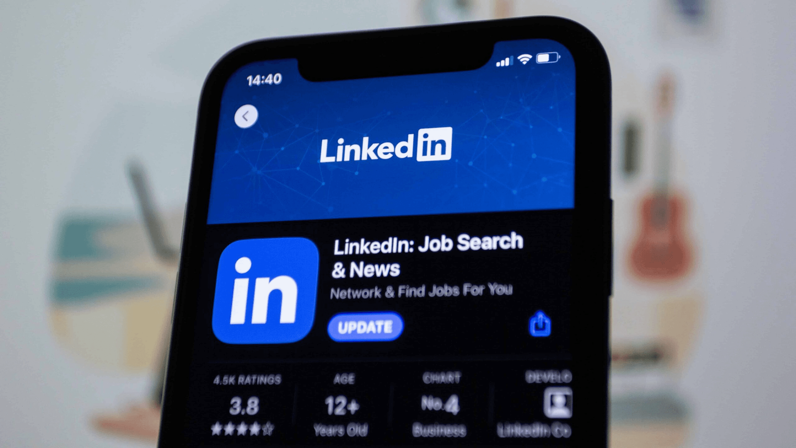 Smartphone displaying LinkedIn app download page - How to Add Website Link to LinkedIn Profile