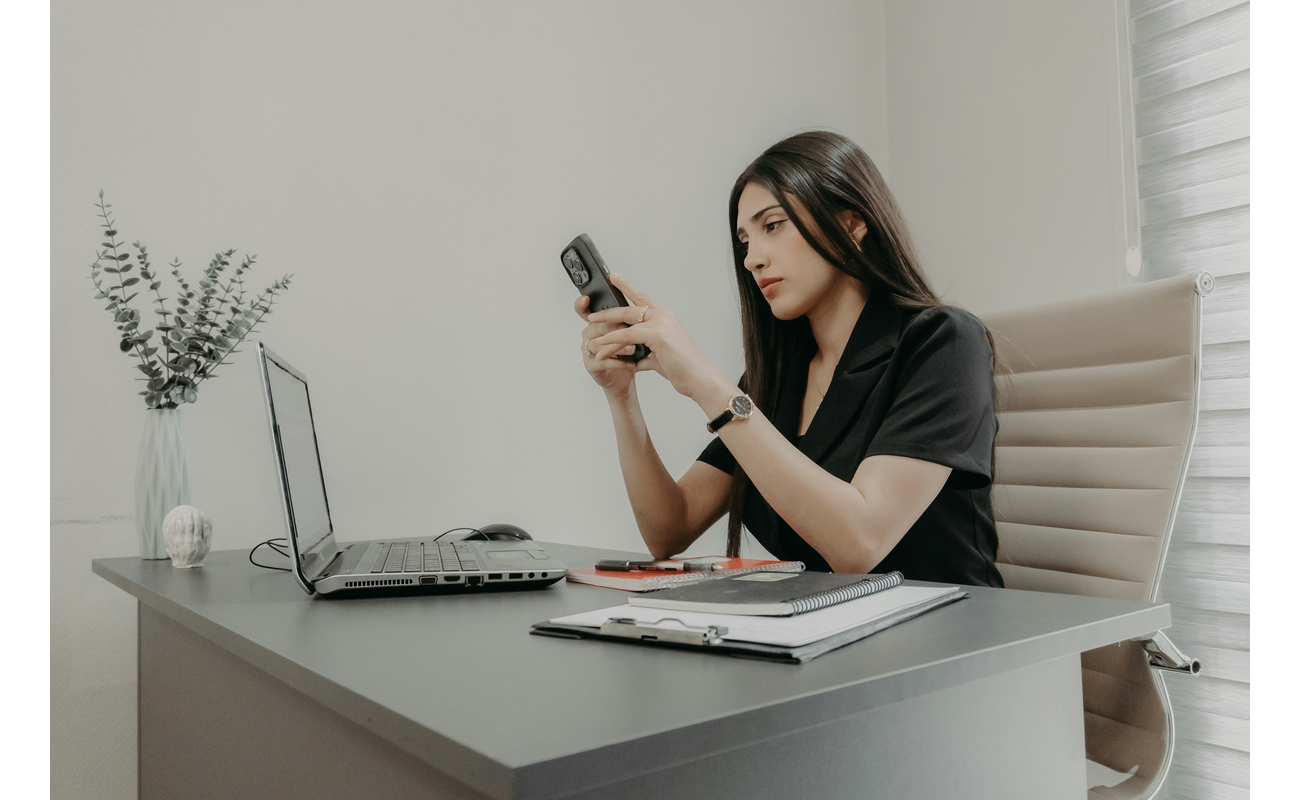 Person Using Phone - Tap to Share