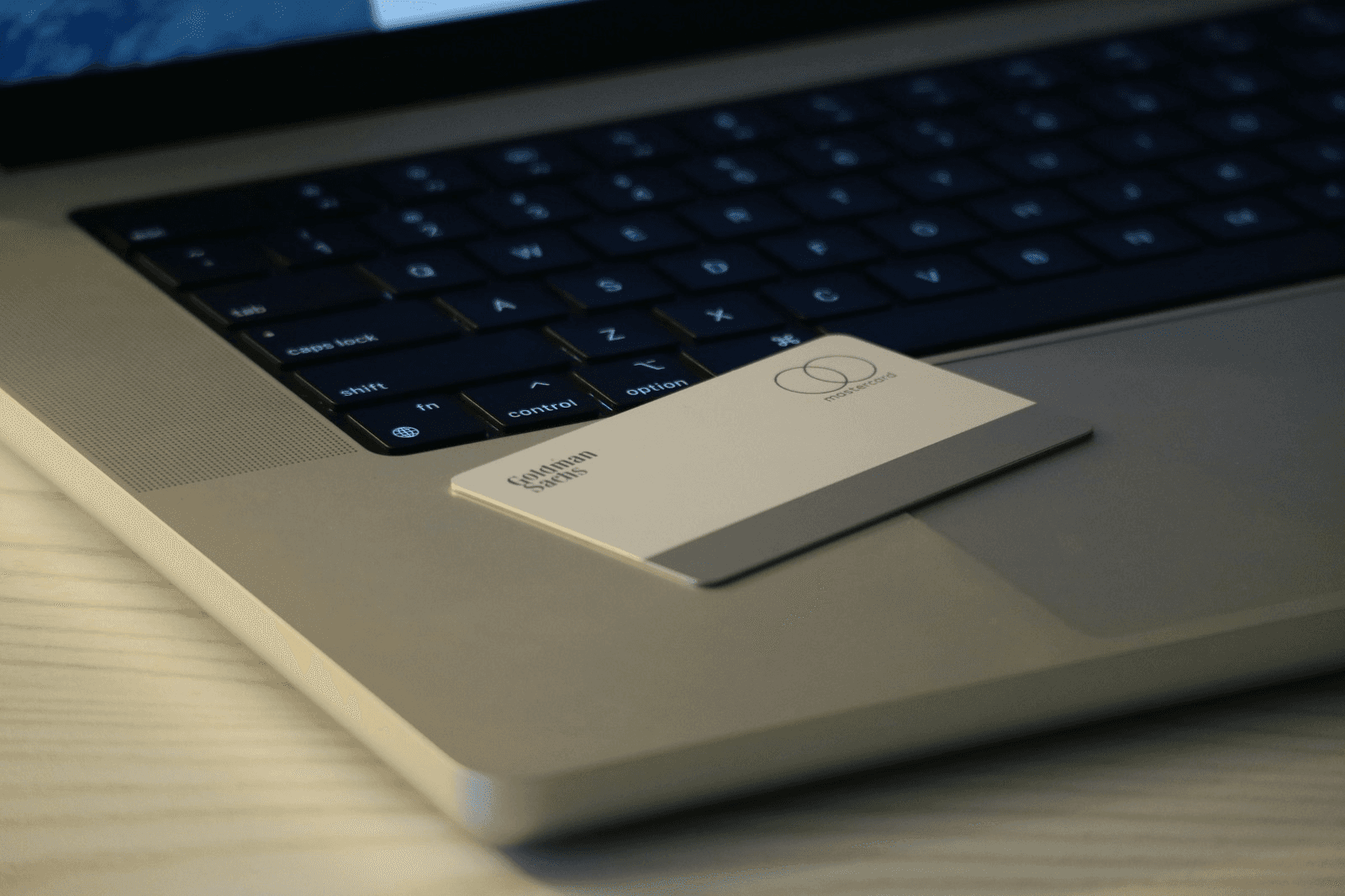 Credit card resting on laptop keyboard -  best business card scanners