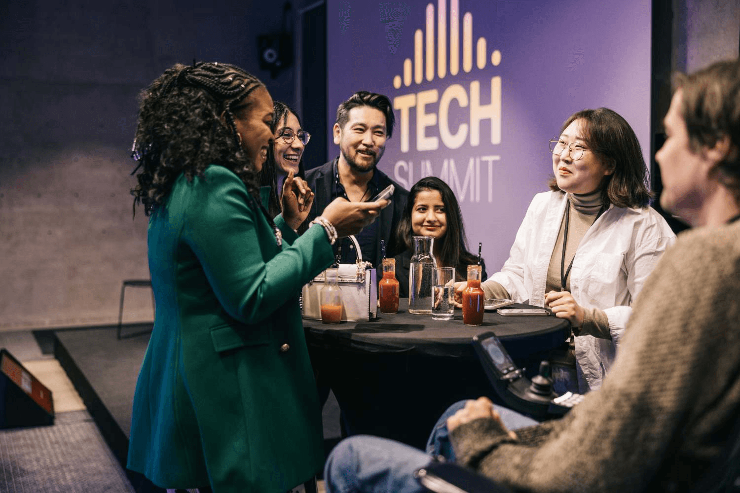 People networking at Tech Summit event -  Networking Activity Ideas for Conferences