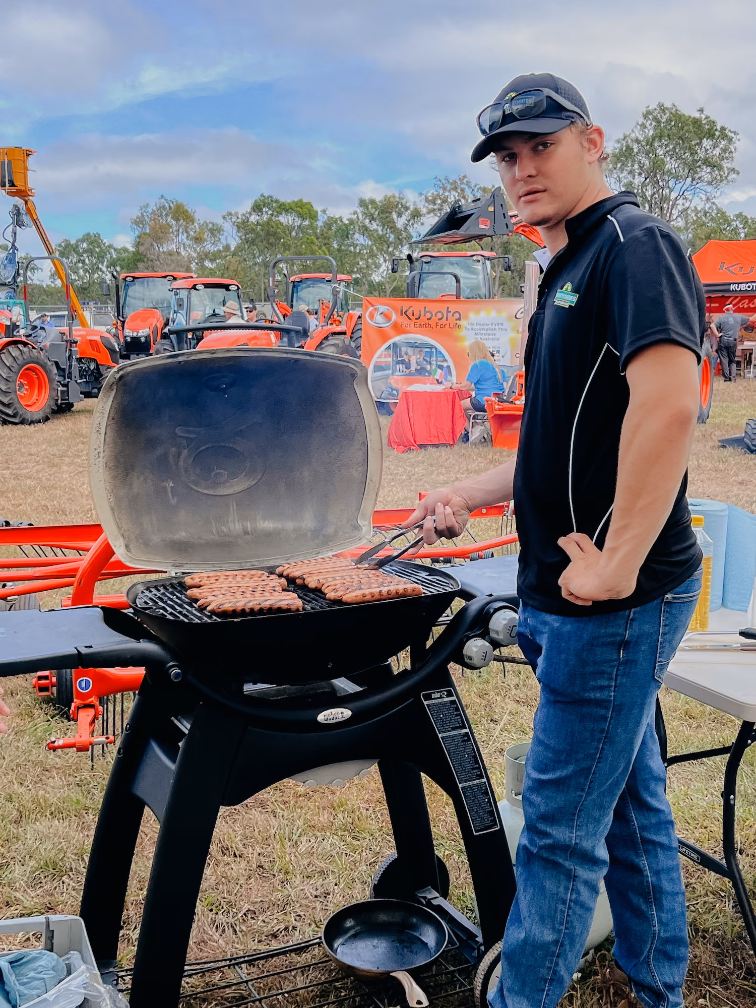 Tolga Technician Jackson cooking up a storm on the BBQ