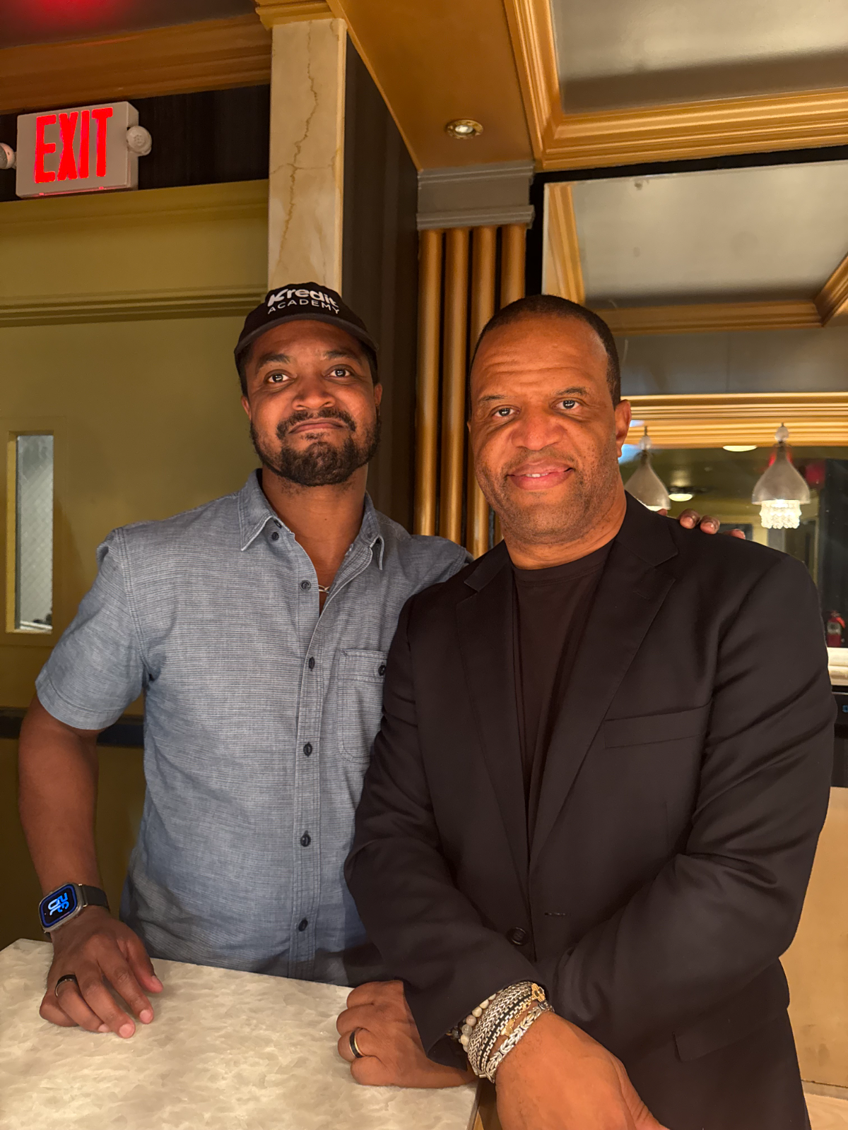 Evan Leaphart with John Hope Bryant, founder of Operation HOPE