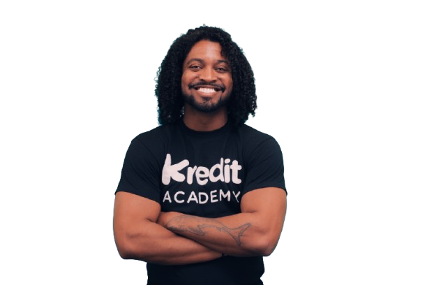 Evan Leaphart, arms folded, in a Kredit Academy shirt