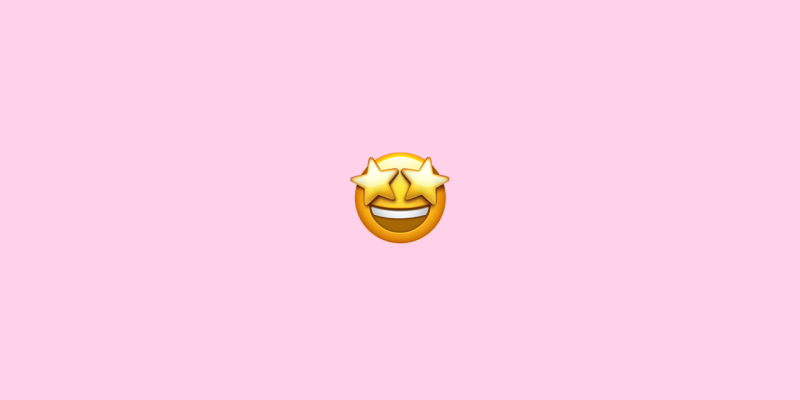 Star eyes emoji on a pink background