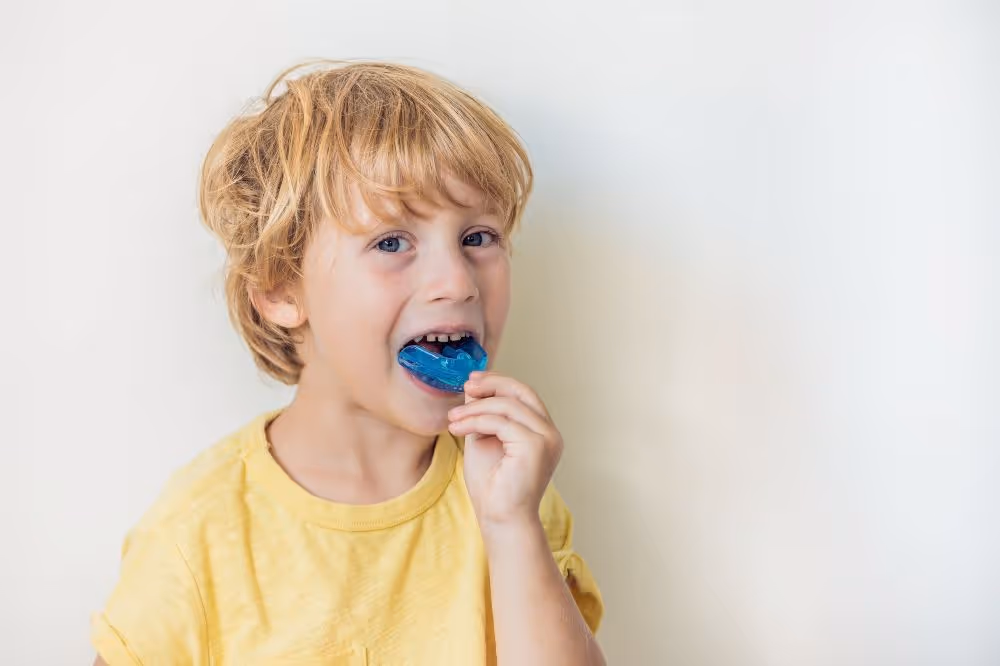 child using mouthguard