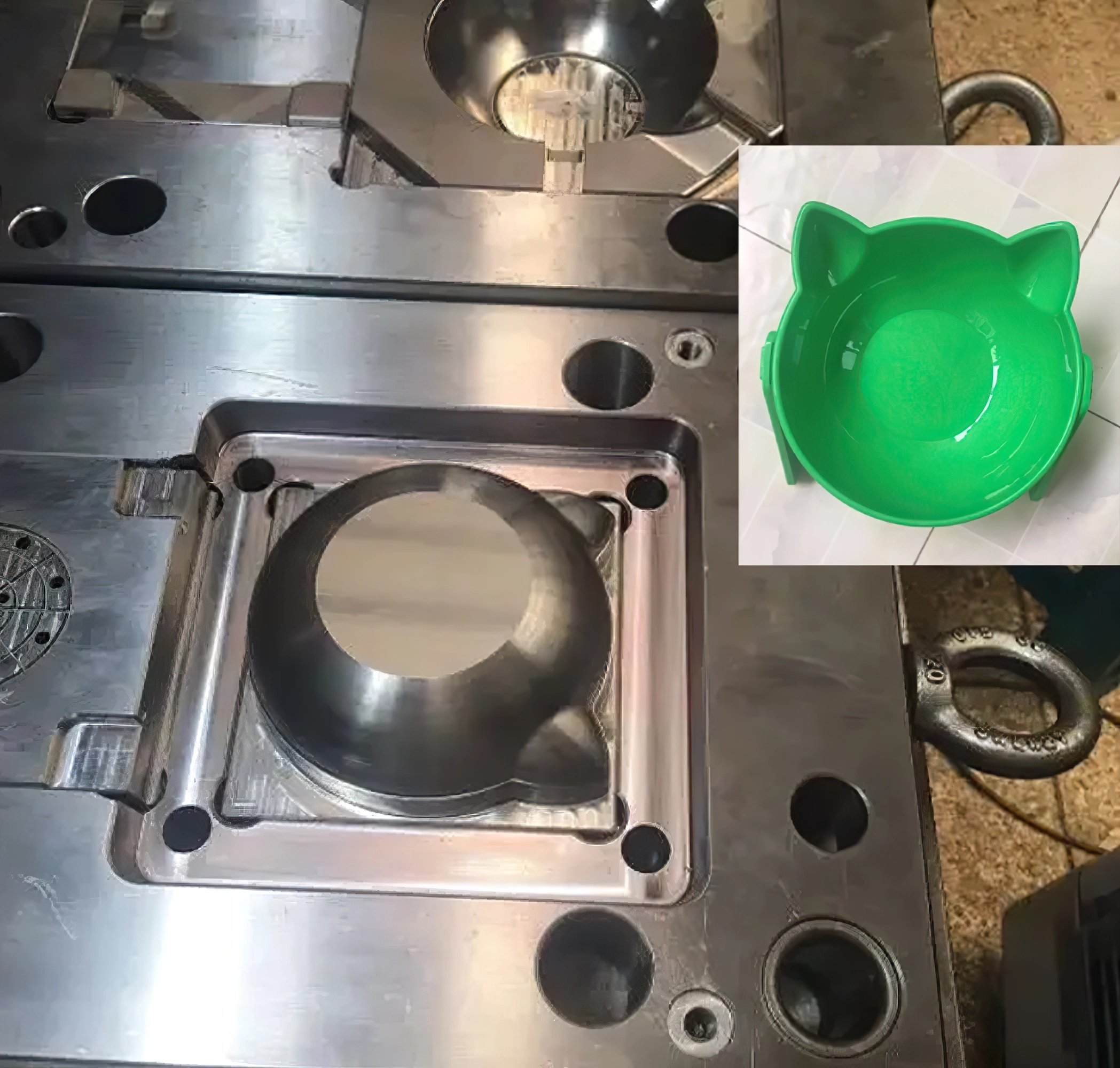 Metal mold for manufacturing a green cat-shaped pet bowl shown in an inset image.