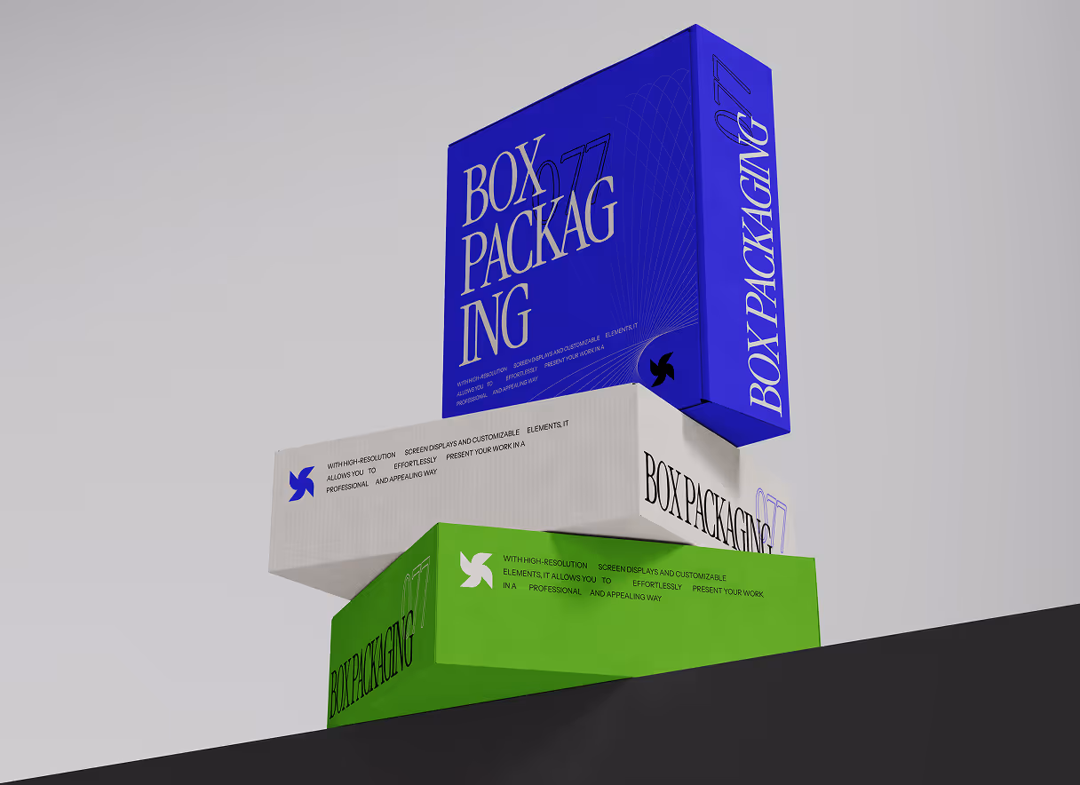 Three stacked rectangular boxes for packaging design in blue, white, and green, each labeled 'BOX PACKAGING 77' with small text and a pinwheel logo.