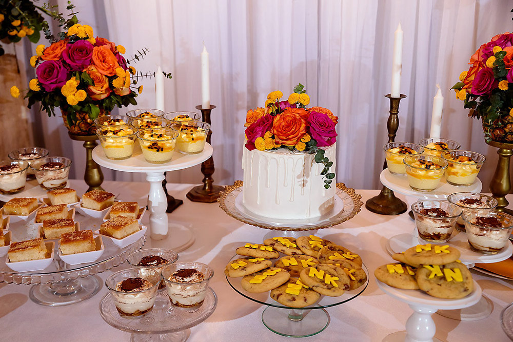 small wedding cake with deserts