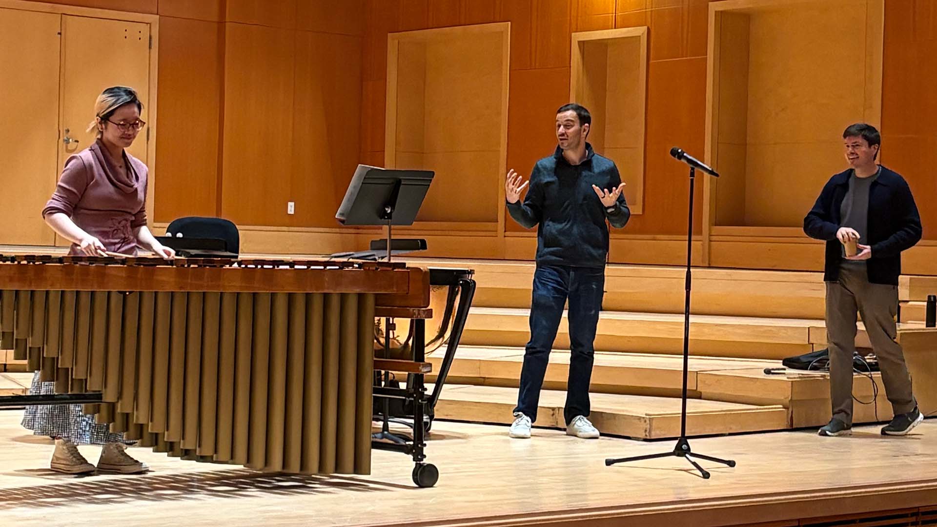 An Emerald City Music musician coaches an emerging student during a masterclass.