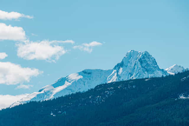 Mountain covered in snow on a bright sunny day