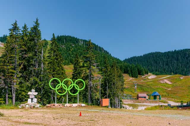 Green olympic rings in Vancouver Canada on top of Cypress mountain