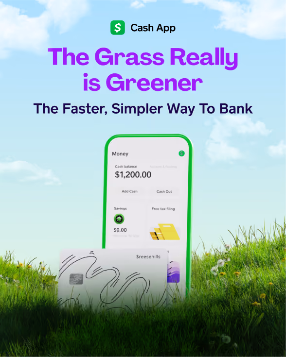 phone and custom debt card in the grass