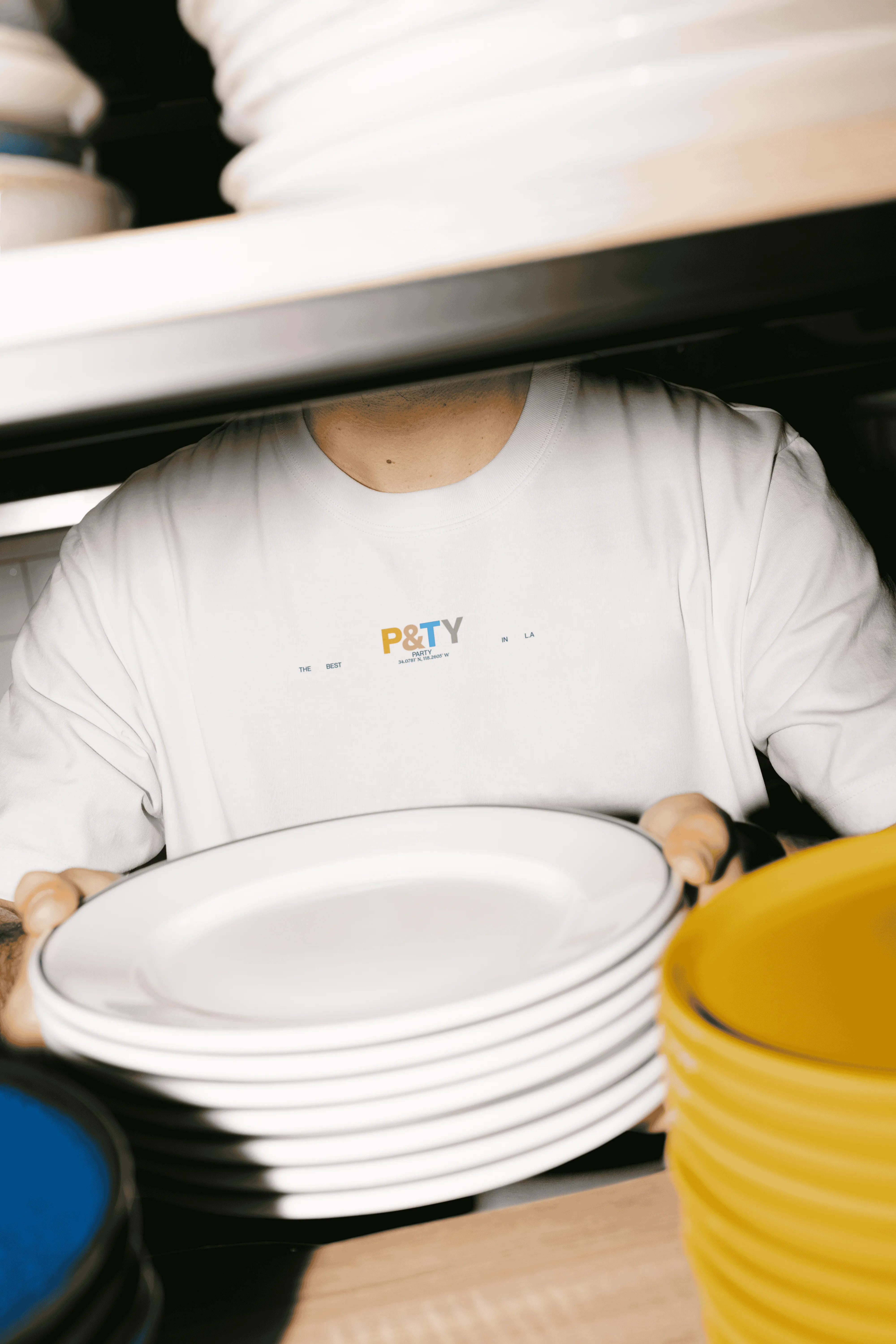 Person wearing a shirt they please and thank you logo