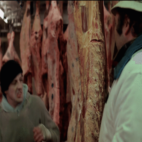 Rocky practicing his punches in the meatlocker