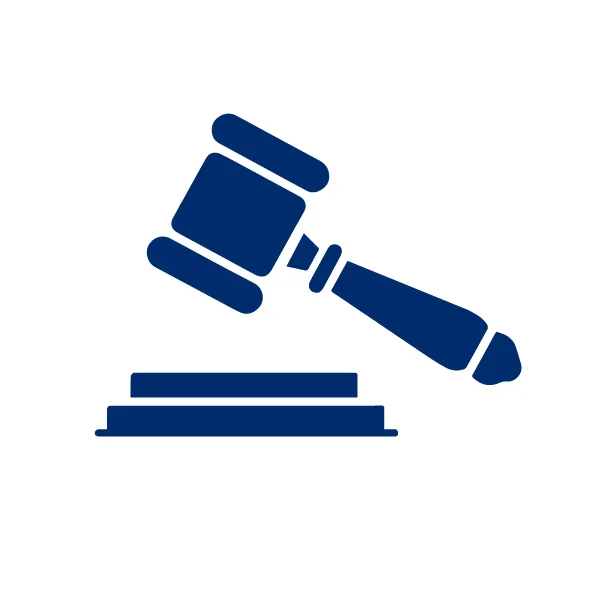 Blå dommerklubbe hæver sig over dommerskiven.