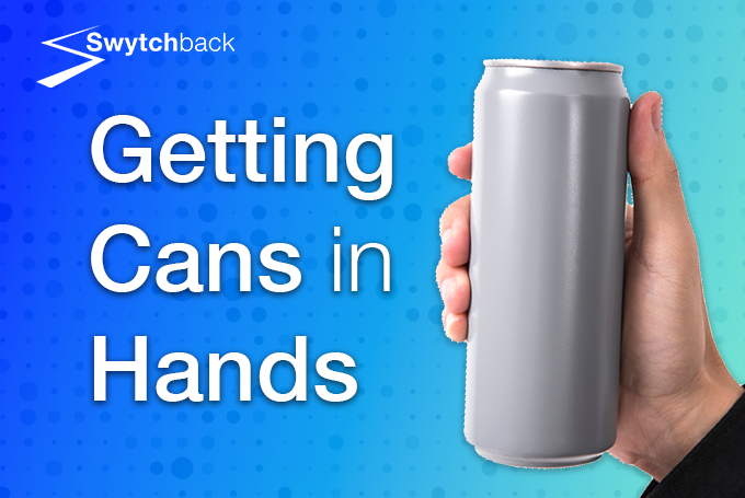 Hand holding a can