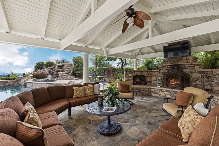 Covered patio with outdoor fireplace