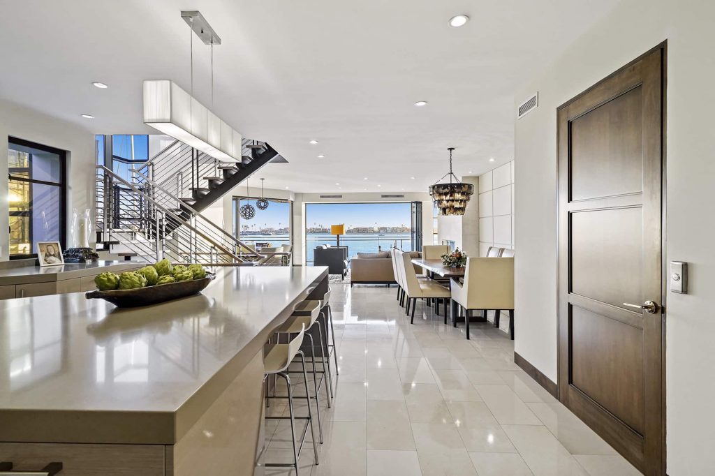 Modern interior looking out to water views in Long Beach's Naples Island