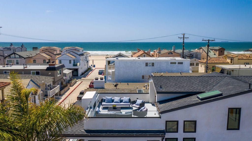 Birds eye view of Newport Beach house with rooftop patio