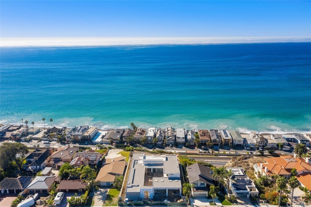 Aerial view of Dana Point coastline with homes