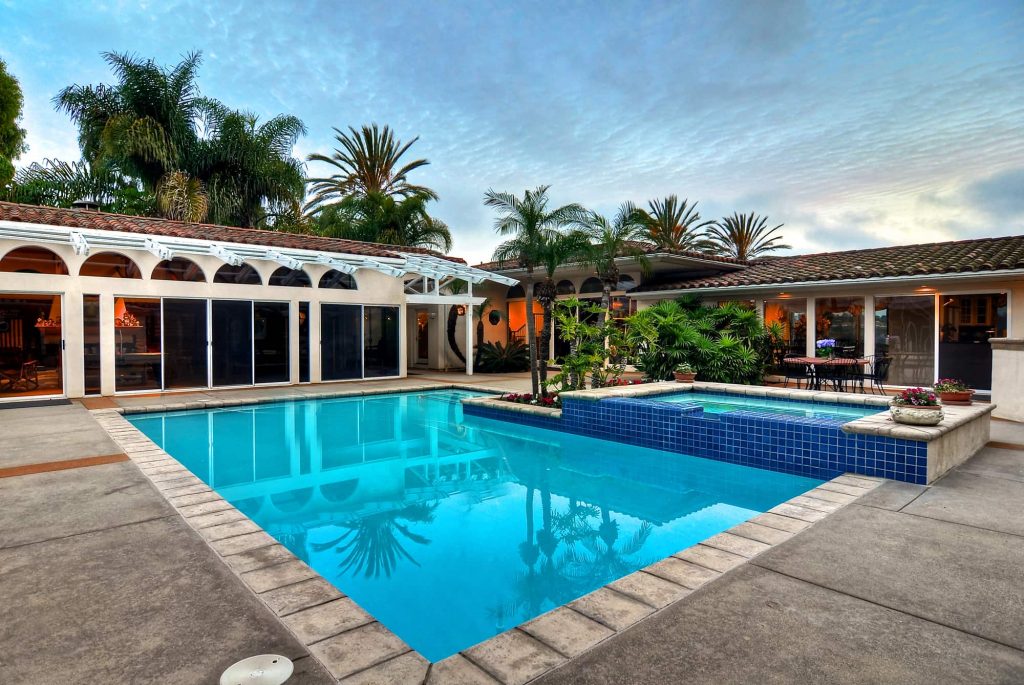 Backyard pool with outdoor entertaining spaces