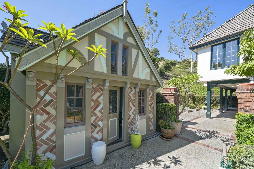 Custom playhouse with brick and tile design