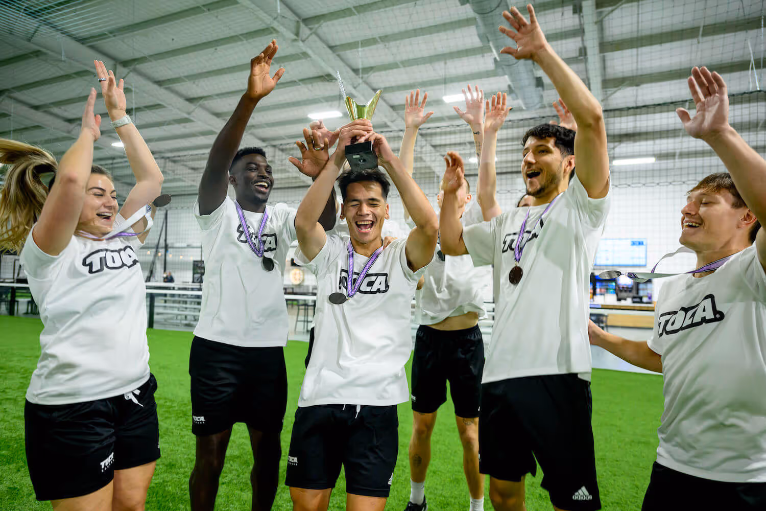 Soccer tournament players celebrating their win.