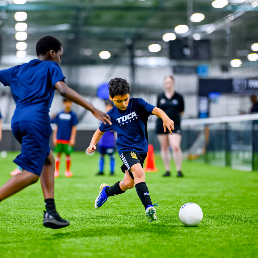 Young soccer enjoying game