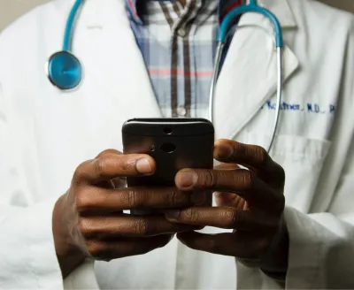 doctor holding a smartphone