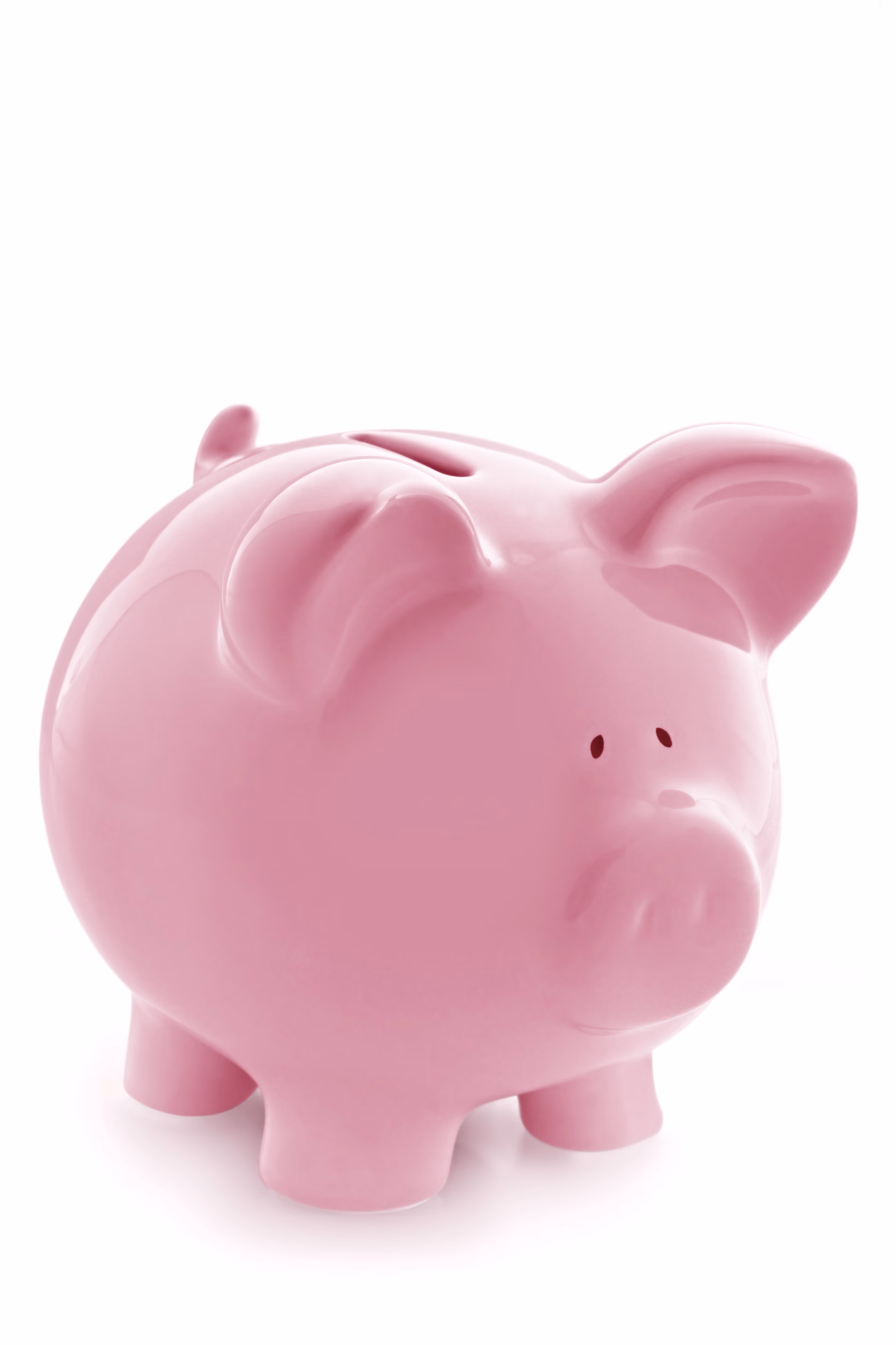 A shiny pink ceramic piggy bank on a white background.