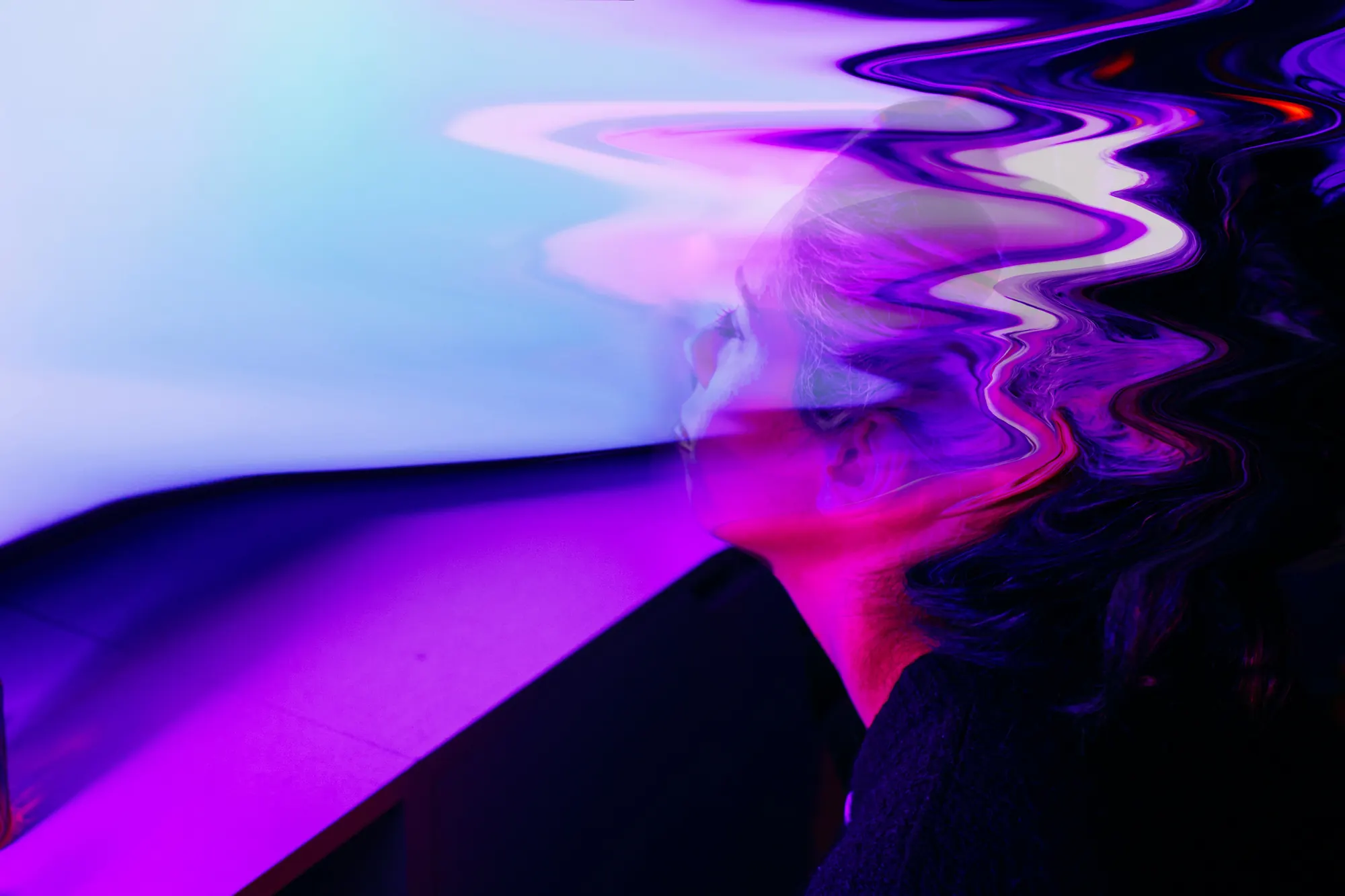 Woman's profile with hair distorted by purple and blue light waves against a glowing background.