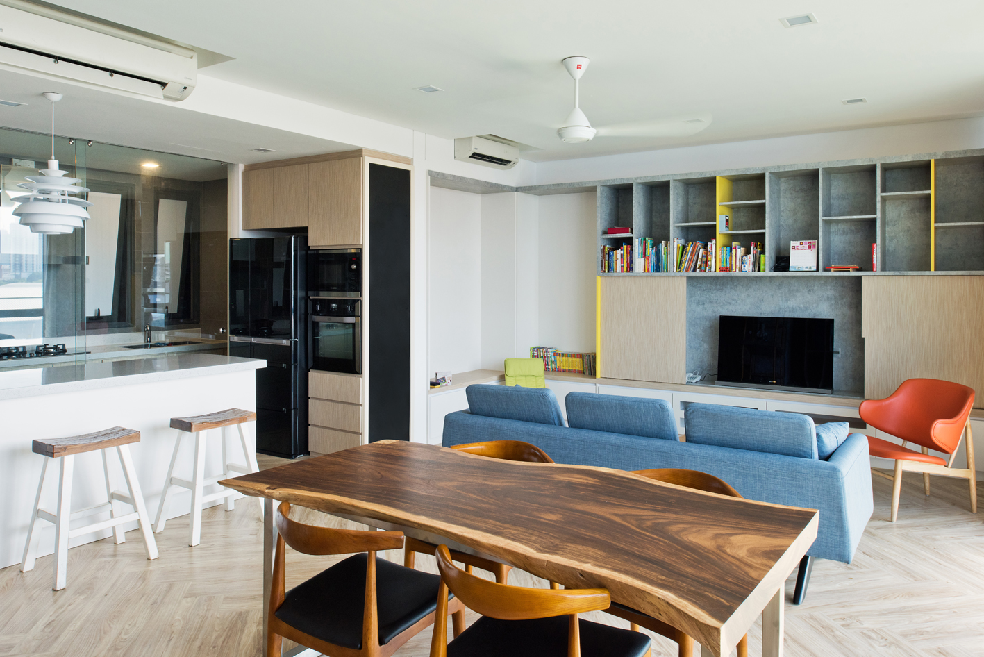 Open living and dining with a natural cut dining from Art of Tree