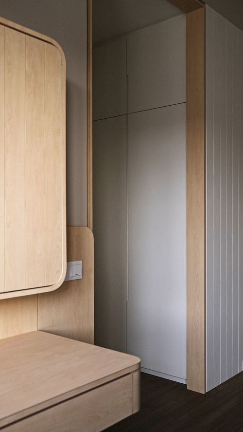 a wooden cabinet with shelves