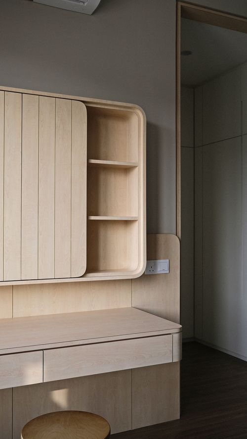 a wooden cabinet with shelves
