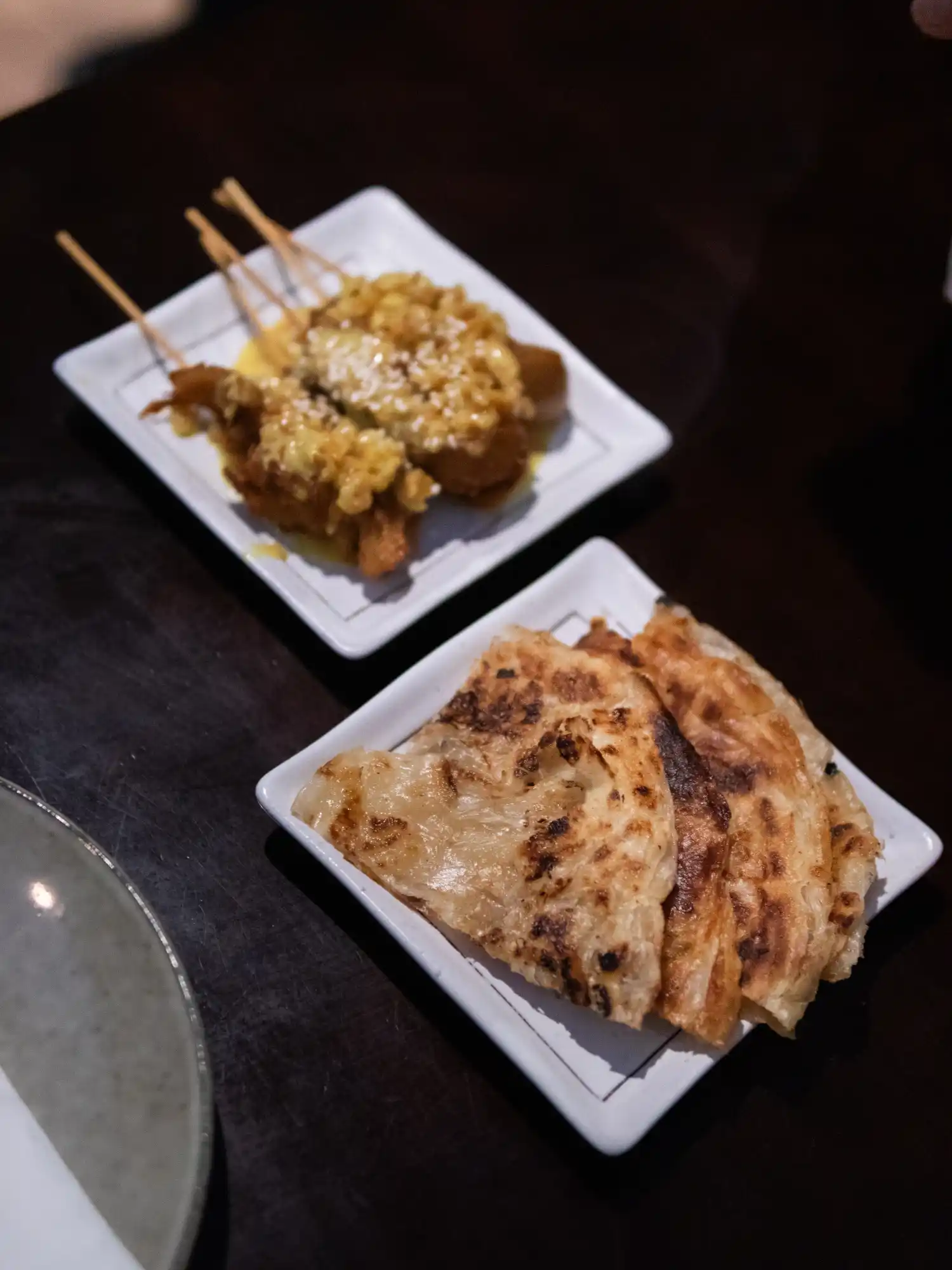 Satay skewers and roti