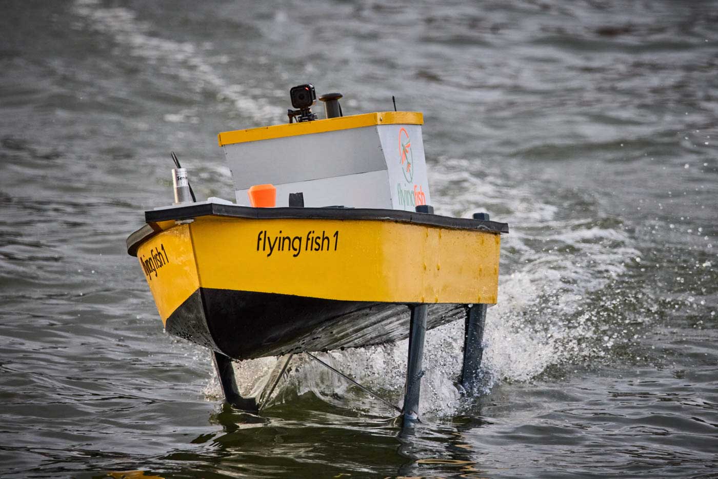 Picture of the Flying Fish 1 hydrofoil demonstrator boat foiling.