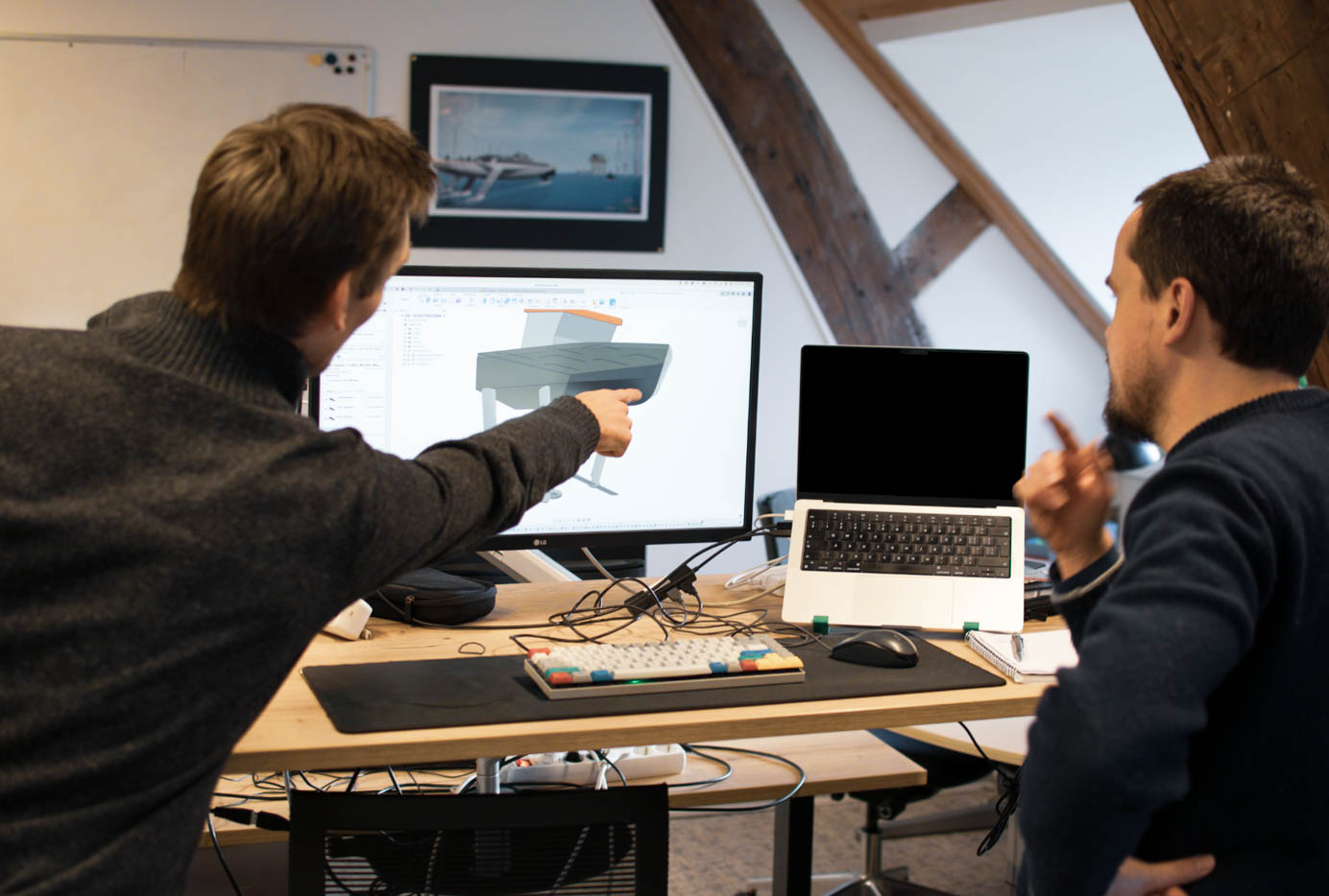 Picture of Flying Fish team members designing the Flying Fish 1 hydrofoil demonstrator boat