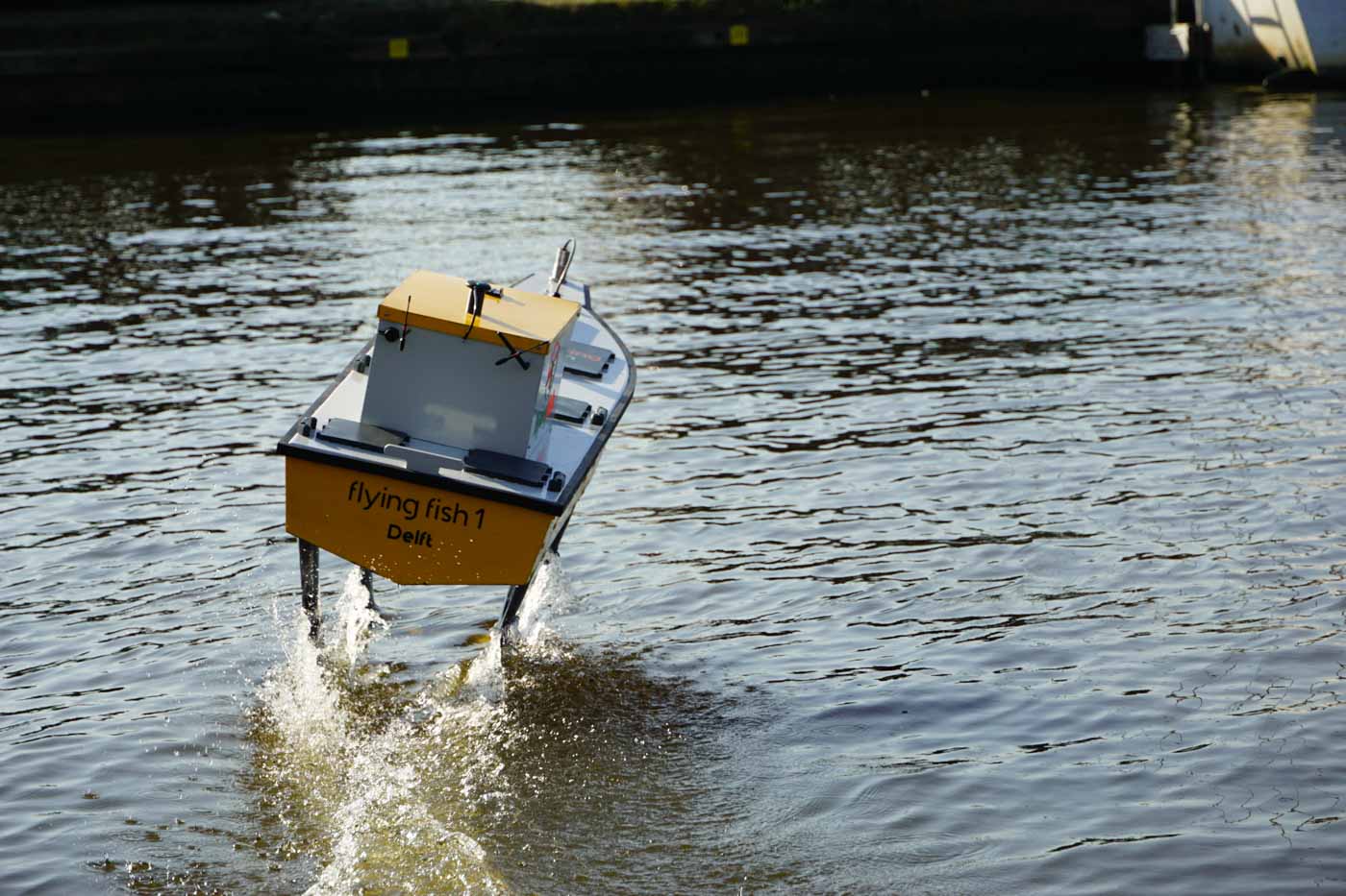 Picture of the Flying Fish 1 hydrofoil demonstrator boat foiling.