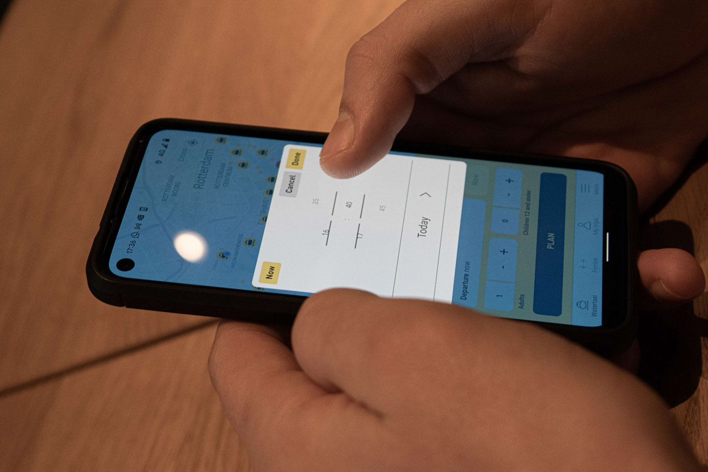 Picture of a phone showing the Flying Fish watertaxi app in use