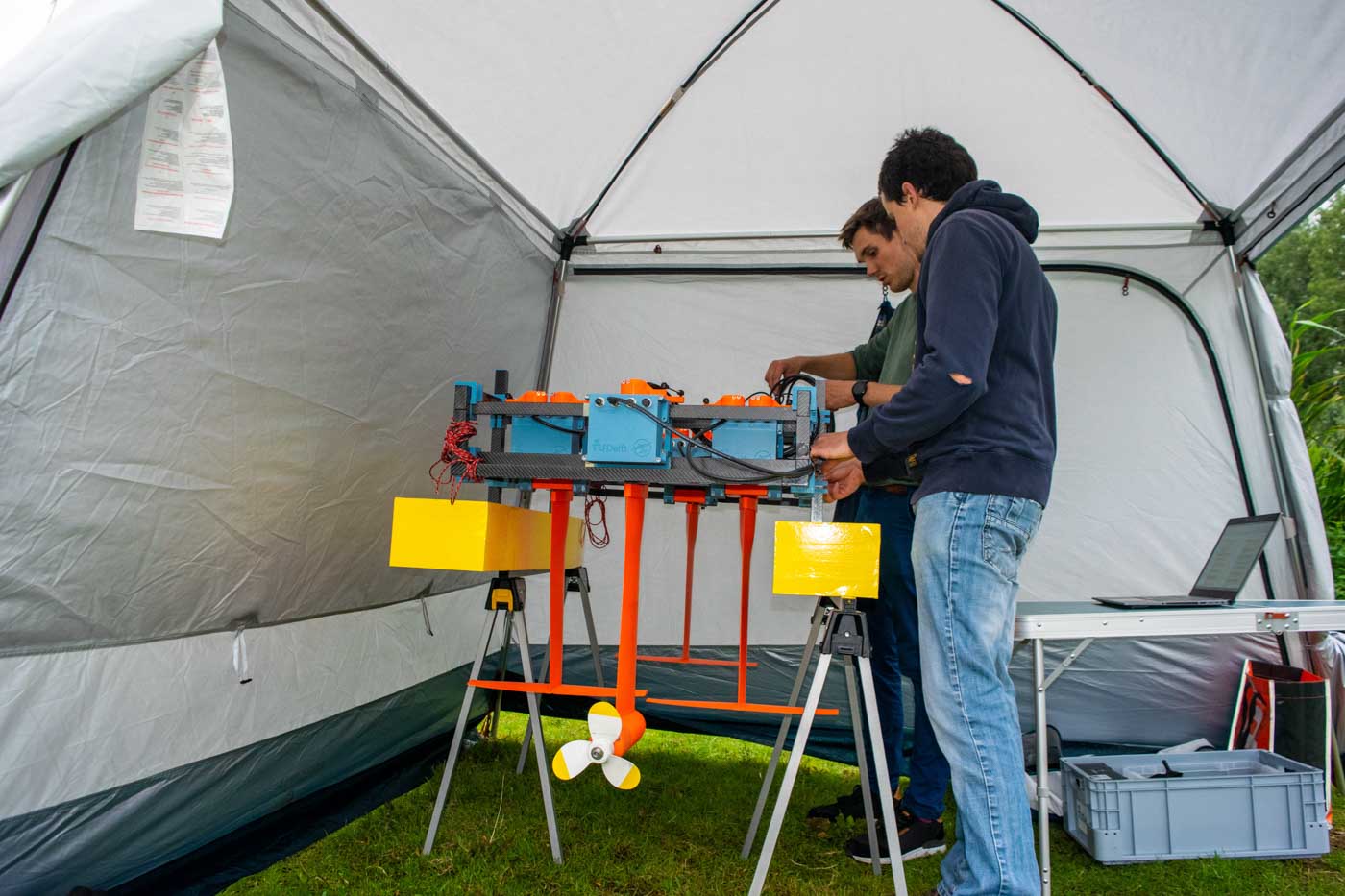 Picture of Flying Fish team members with the HEARP hydrofoil test platform