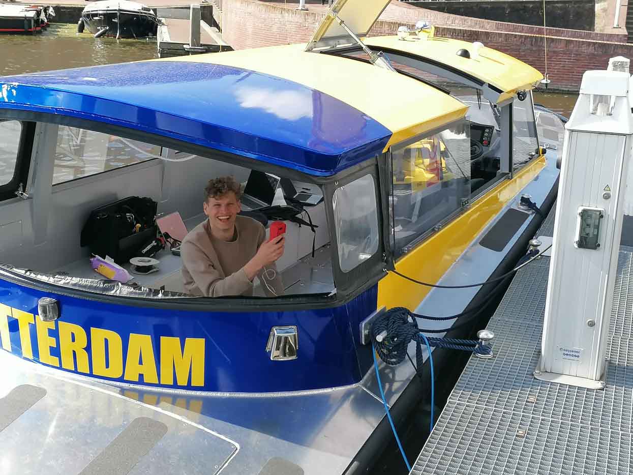 Picture of team members working on the Flying Fish SWIM hydrogen-electric watertaxi 