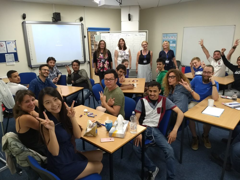 Student practising English pronunciation with a teacher