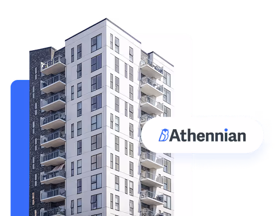 Modern multi-story apartment building with balconies against a white background.